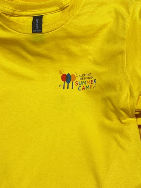 Full-color Alef Bet Preschool Summer Camp logo on the chest of a yellow tee