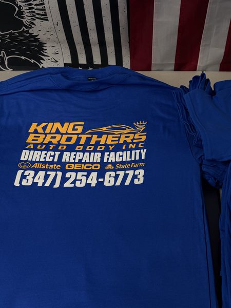 Royal blue tee with a gold and white King Brothers Auto Body back print and phone number